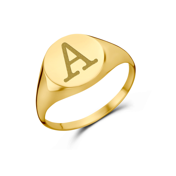 Round gold signet ring with an initial