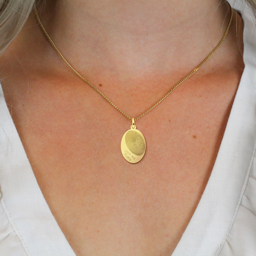 Oval pendant with fingerprint and own handwriting in gold