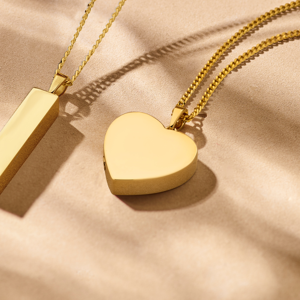 Gold ash pendant in heart shape
