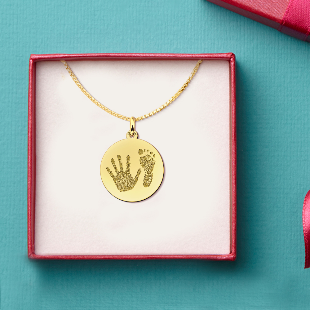 Gold round handprint pendant