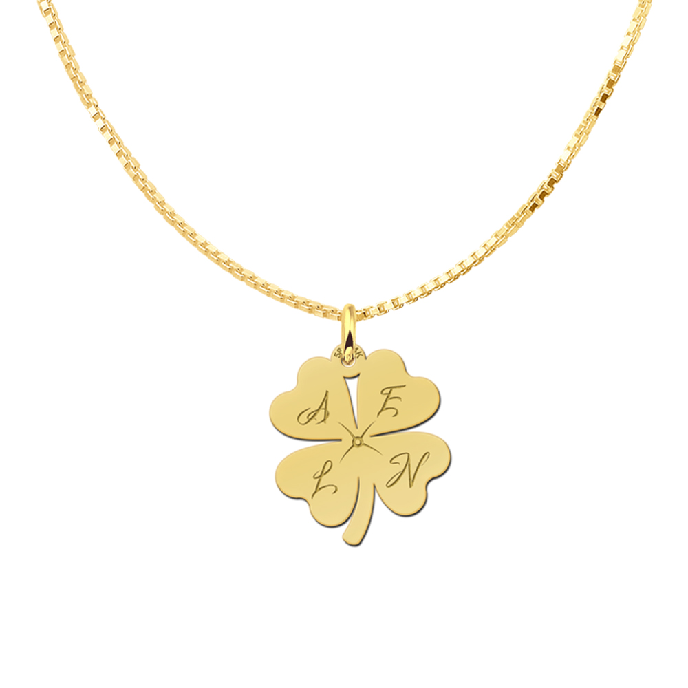 Gold cloverleaf pendant with initials