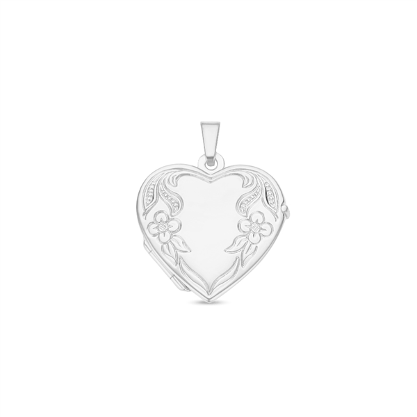 Silver heart medallion with flower engraving