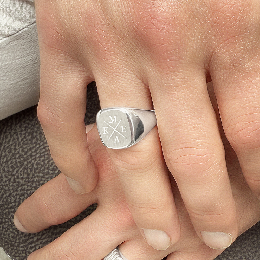 Silver men’s signet ring with initials