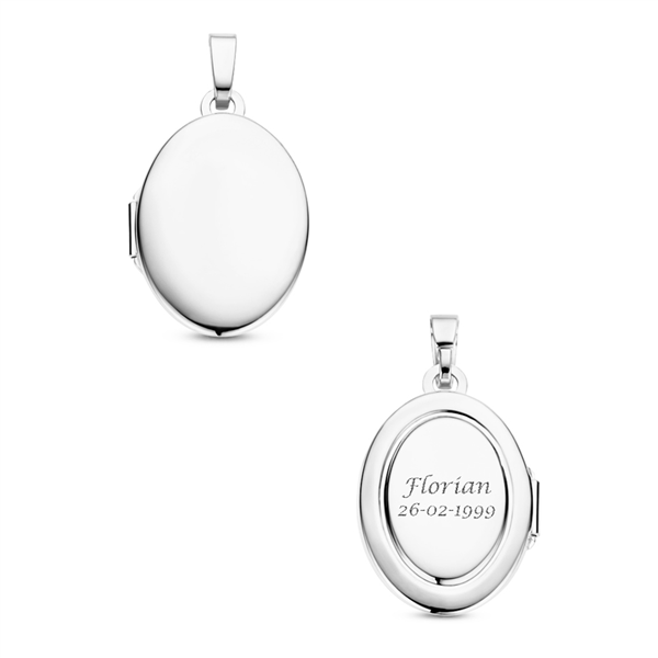 Silver oval medallion with engraving