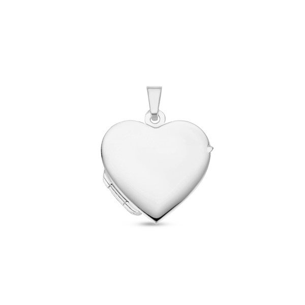 Silver heart medallion with engraving