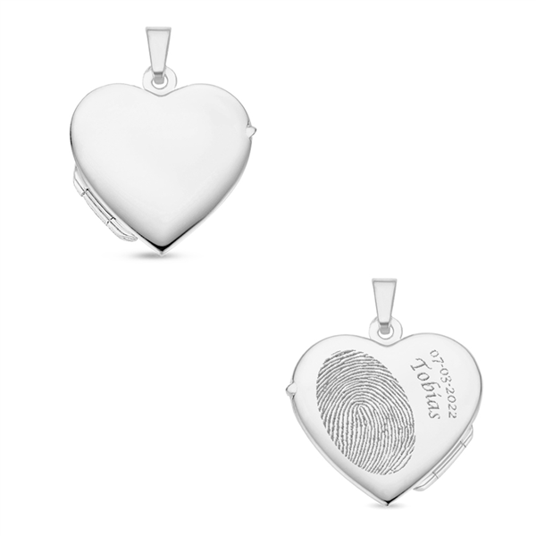 Silver heart medallion with engraving