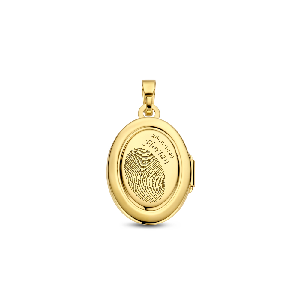 Gold oval medallion with engraving