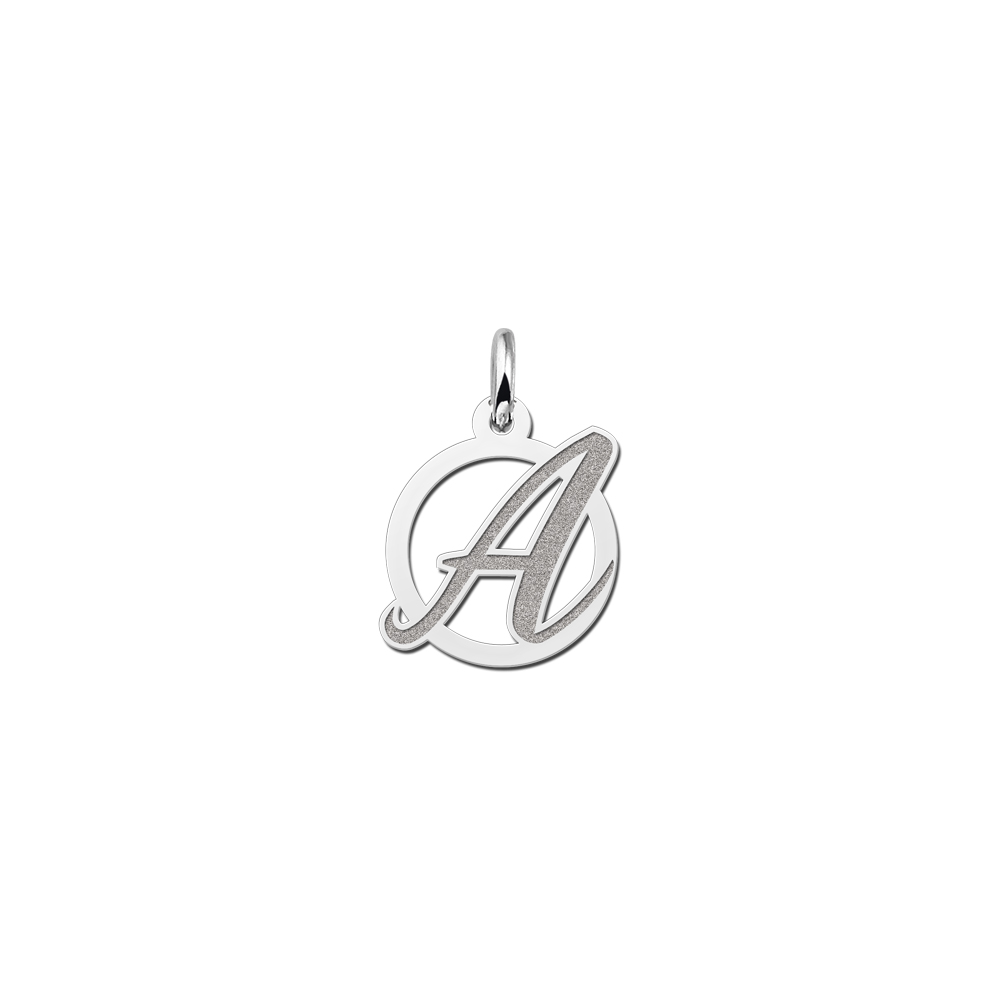 Curved letter pendant of silver