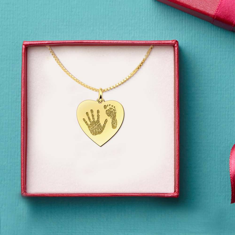 Gold hand and footprint jewellery heart