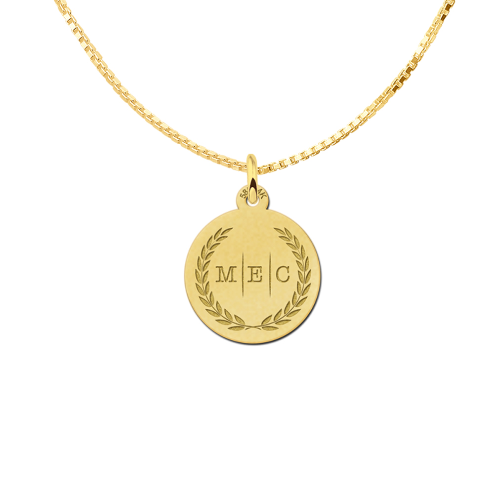 Initial necklace of gold with three initials