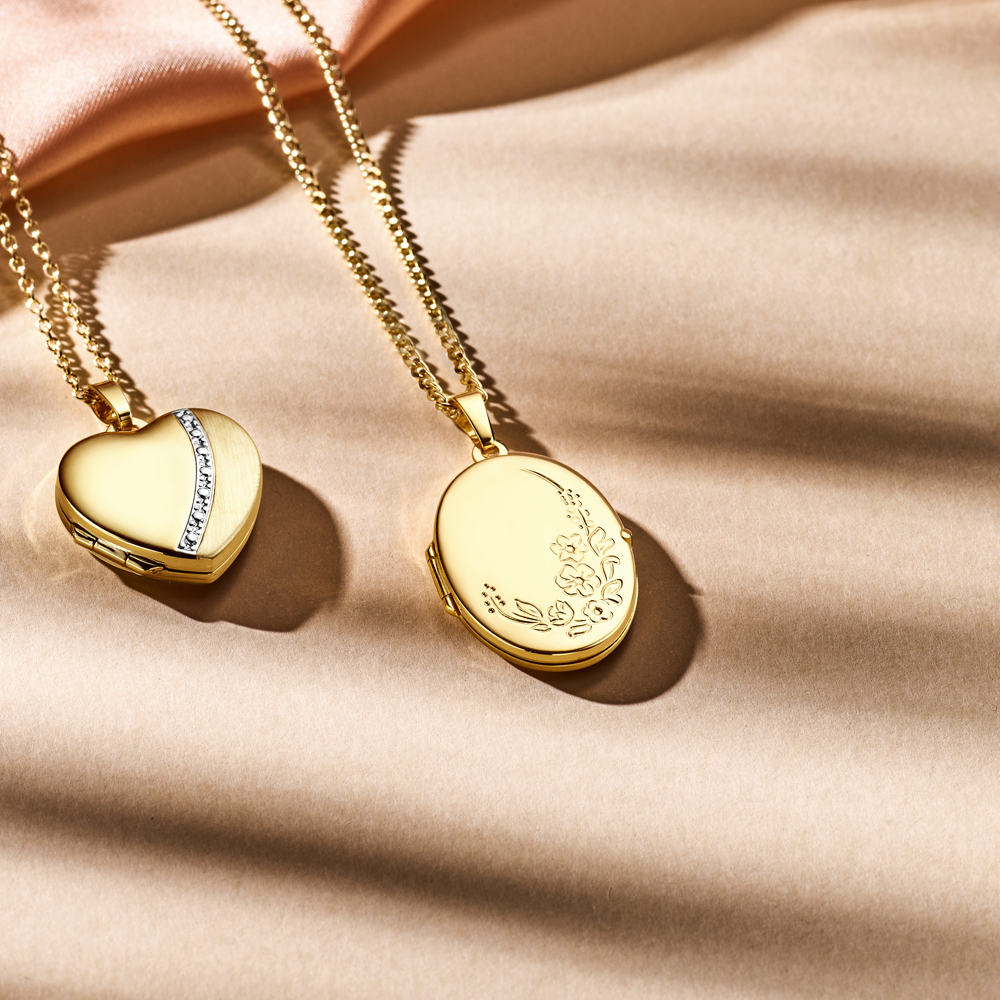 Gold medallion oval with flowers engraving