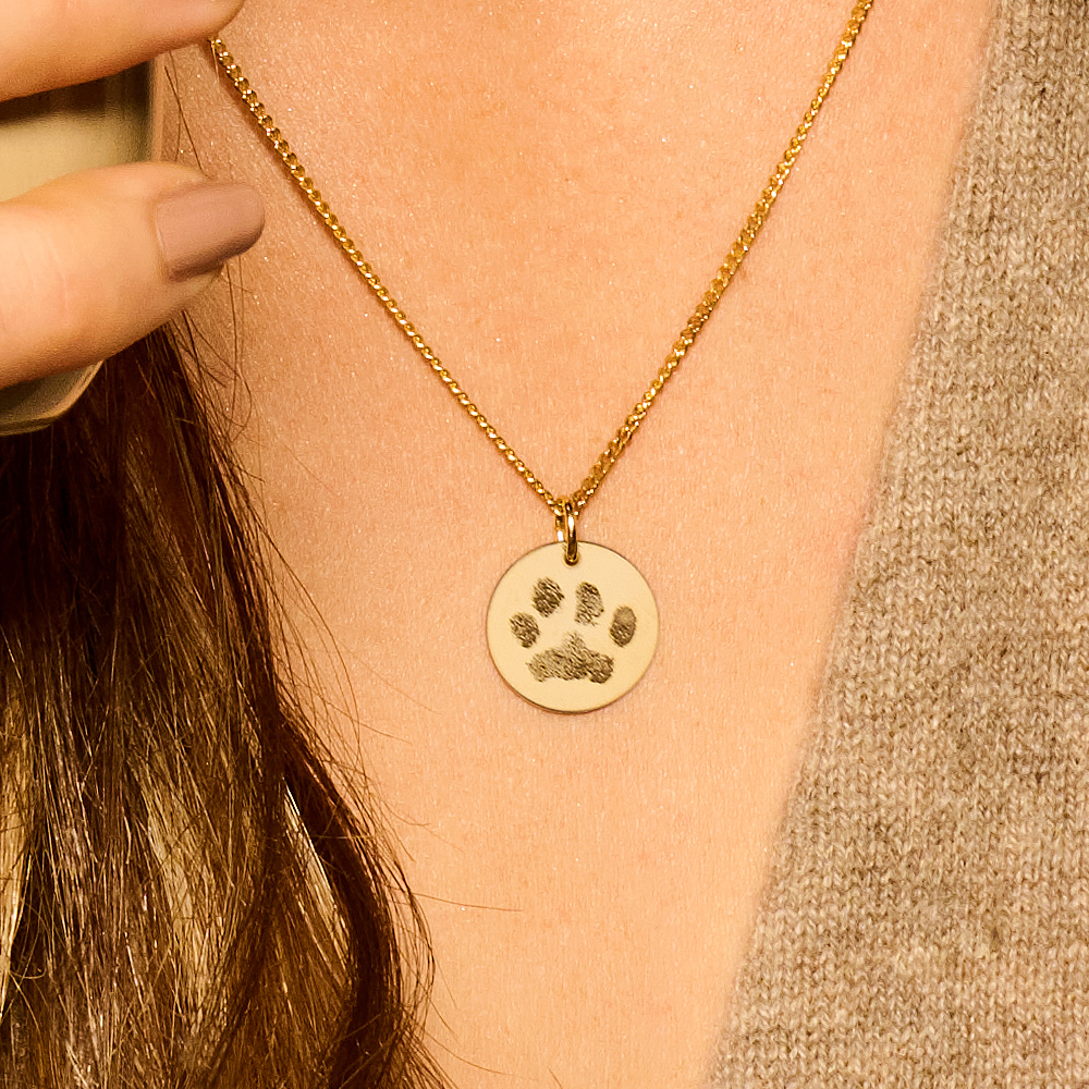 Gold round pawprint pendant