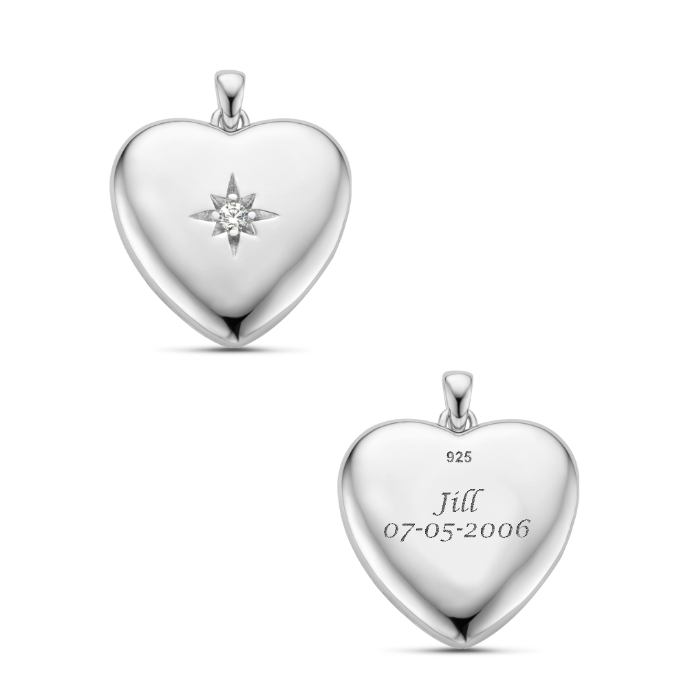Silver heart medallion with a stone
