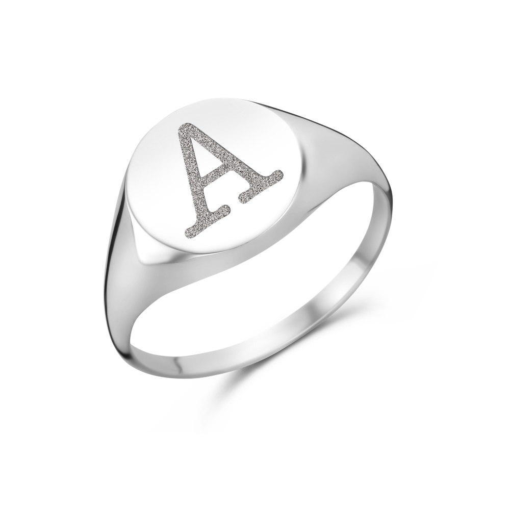 Round silver signet ring with an initial