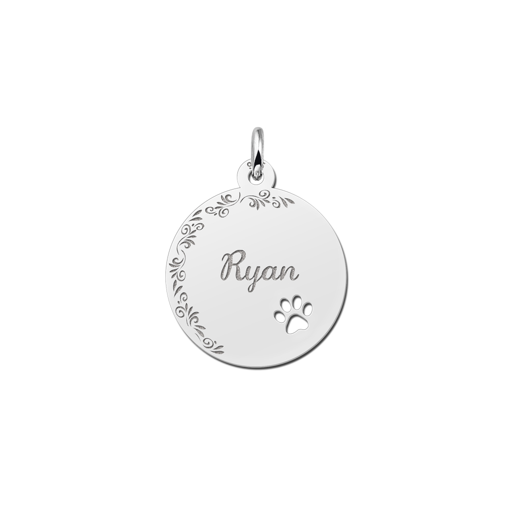 Silver pendant with floral edge and paw print