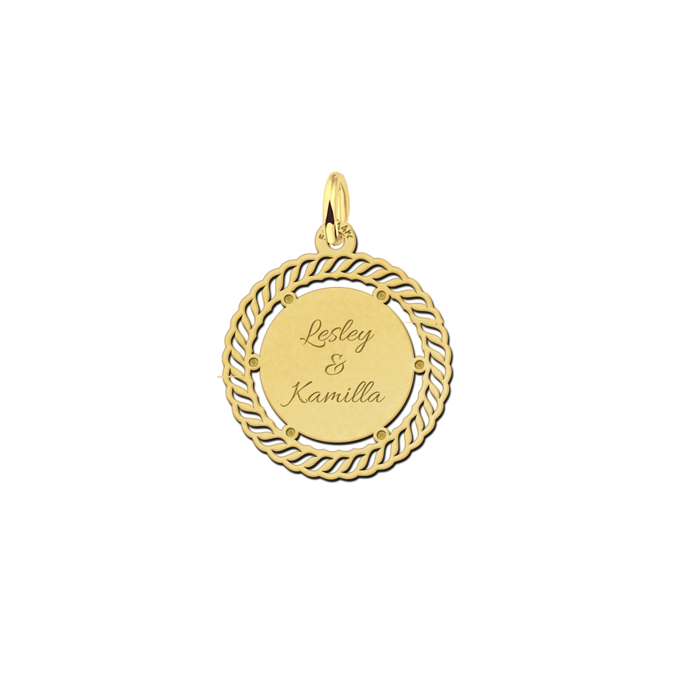 Vintage pendant with decorative edge and engraving in gold