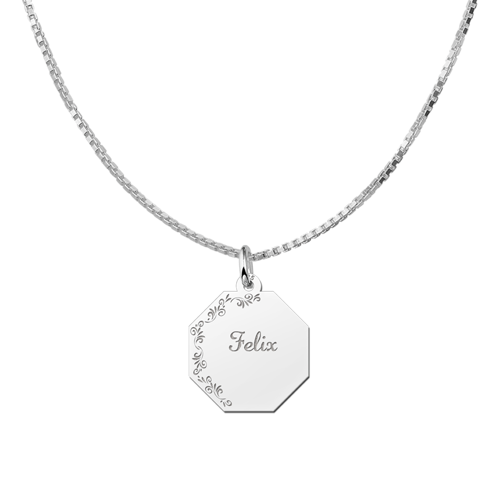 Silver octagonal pendant with floral border and name