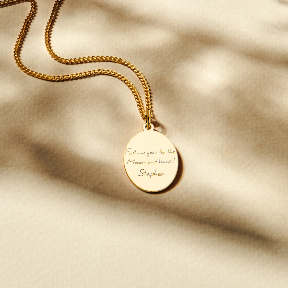 Gold Oval Pendant Engraved with Text
