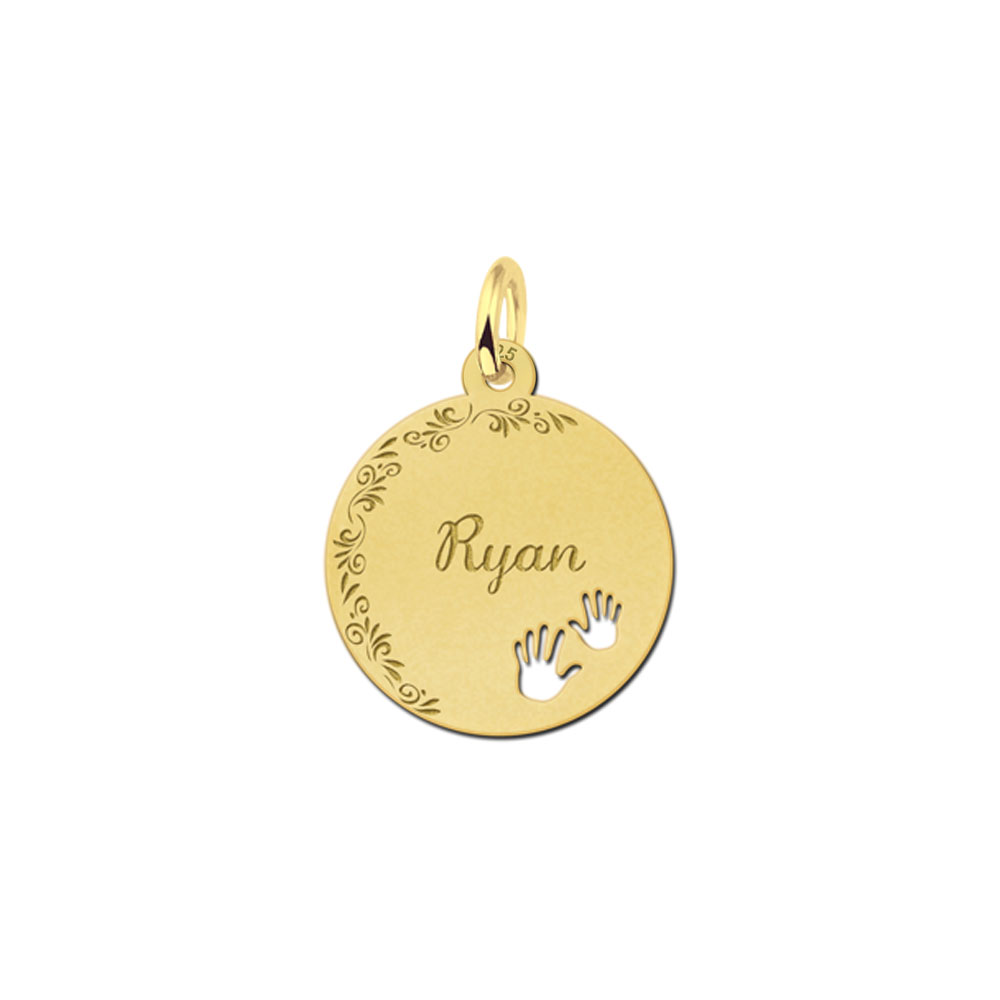Gold-plated pendant with floral border and children's hands