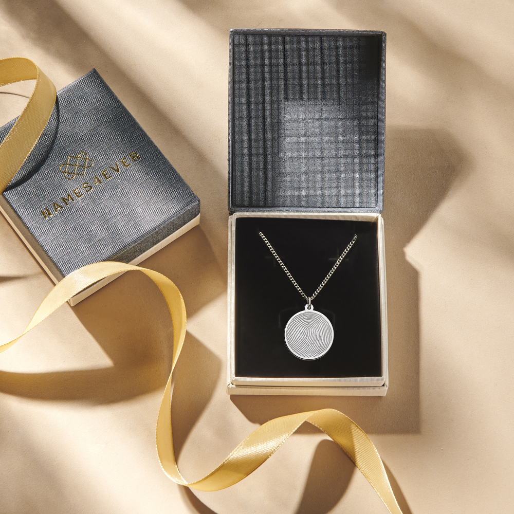 Silver round pendant with full fingerprint