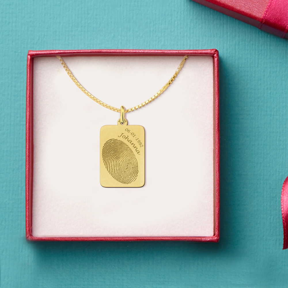 Golden fingerprint dogtag with name and date