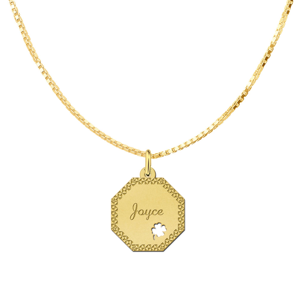 Gold-plated octagonal pendant with decorative border and four-leaf clover