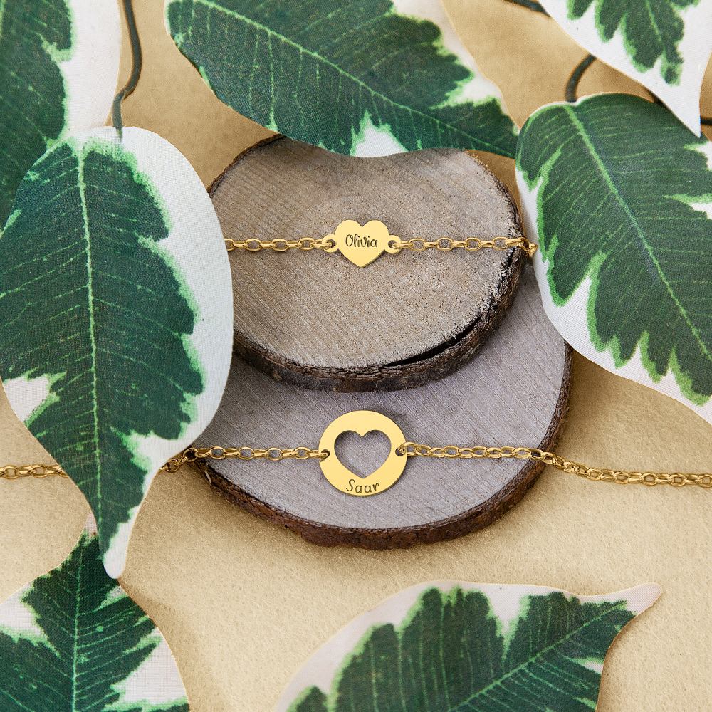 Gold bracelet set with names and hearts