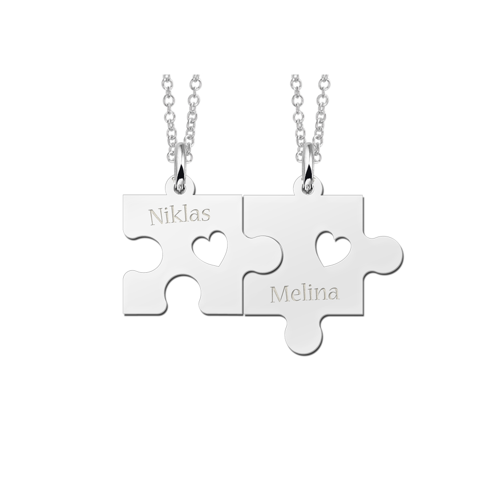Silver friendship necklace with puzzle pieces, hearts and names