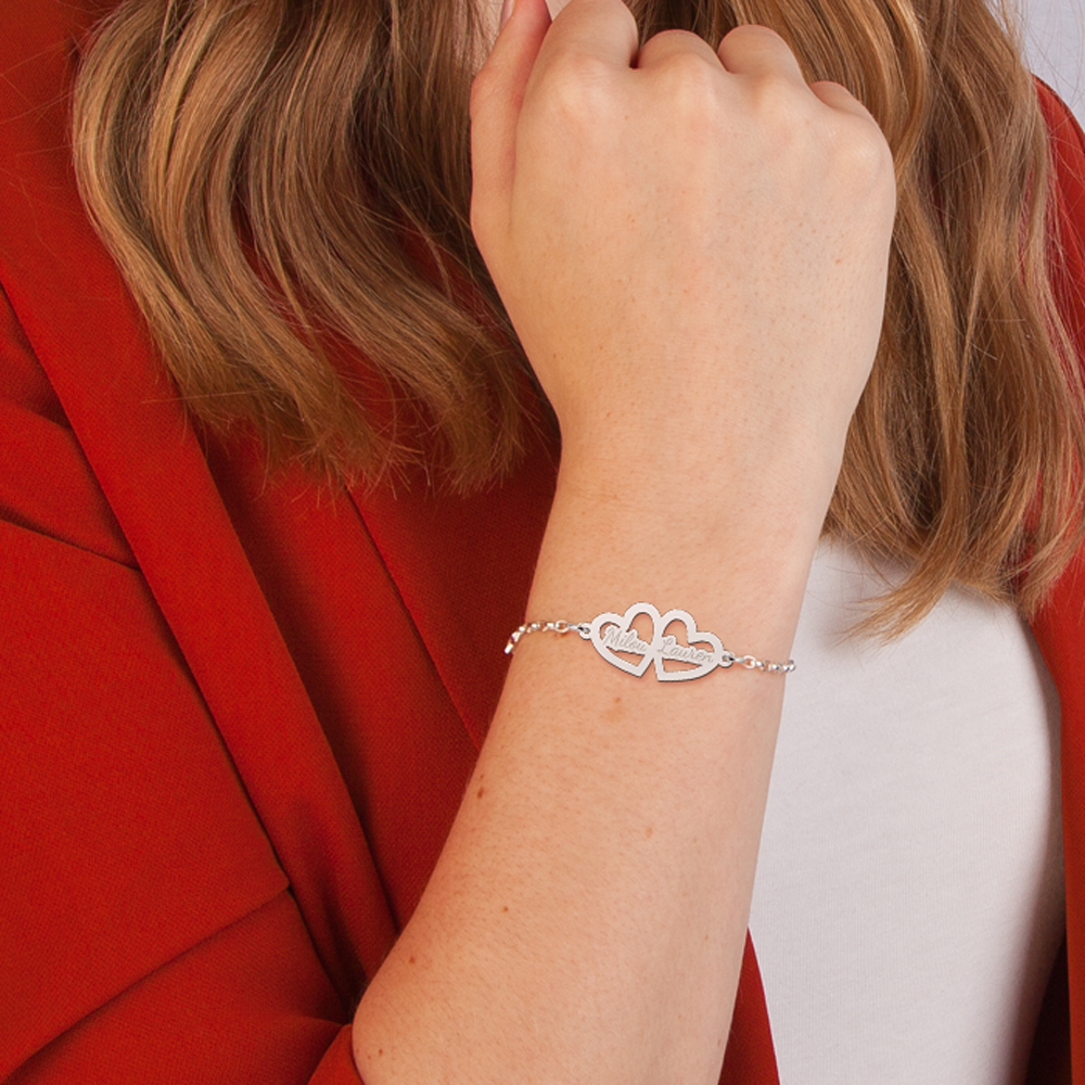 Silver bracelet with two hearts and engraving