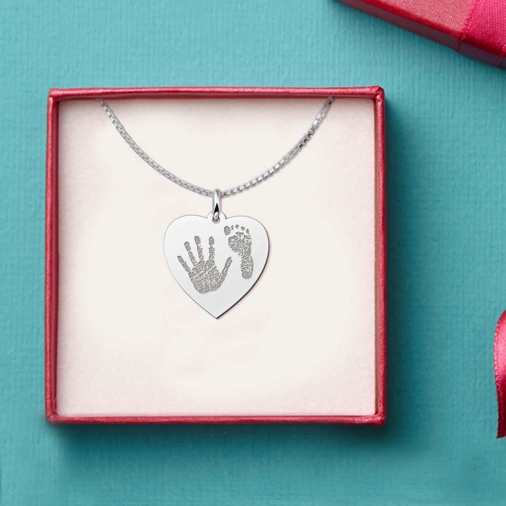 Silver hand and footprint jewellery heart