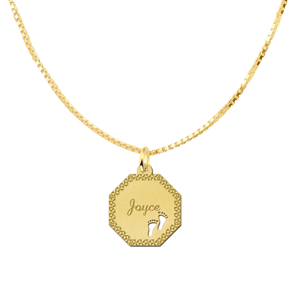 Gold-plated octagonal pendant with decorative border and baby feet