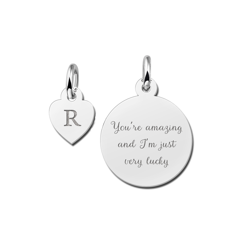 Silver minimalist pendant with letter and text