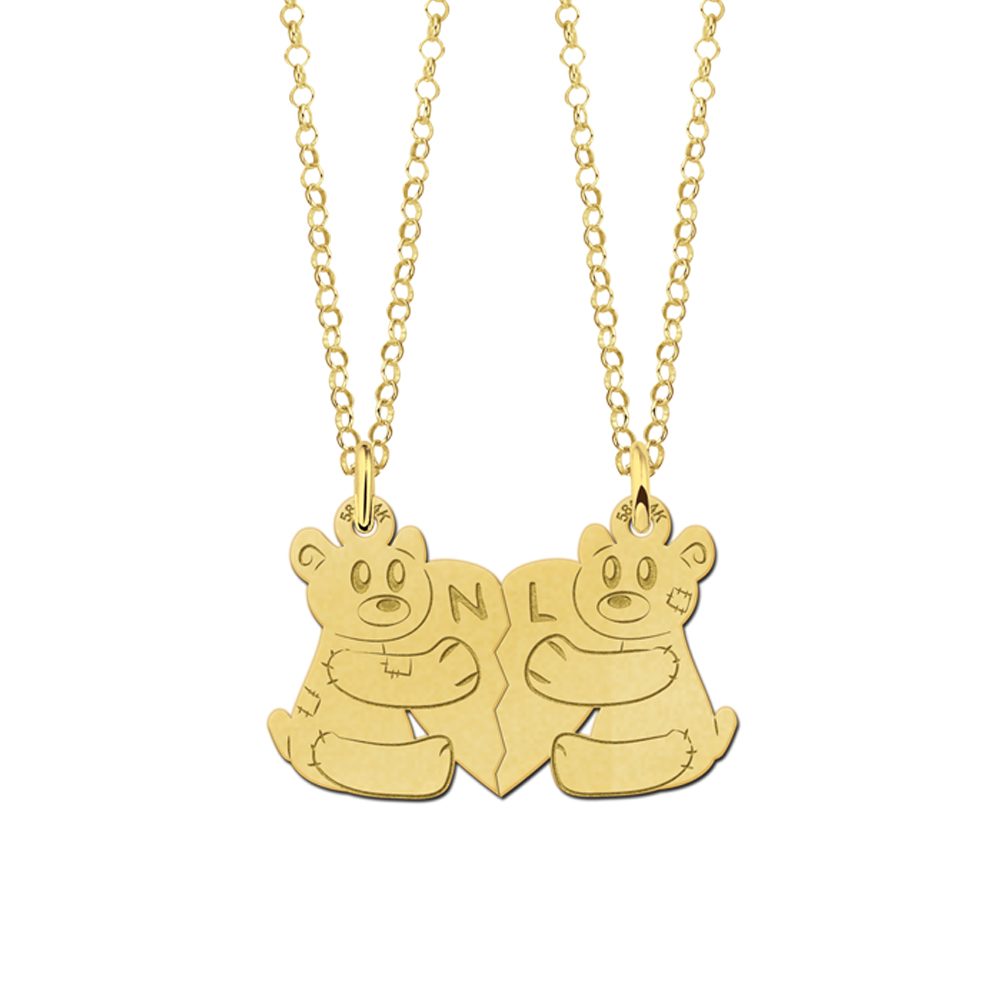 Golden interlocking pendant with bears