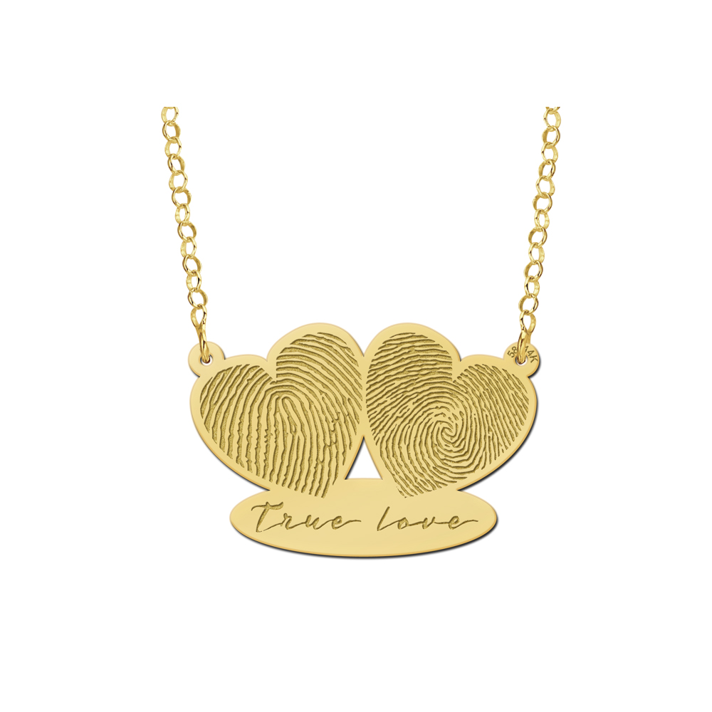Gold pendant with two fingerprints and own handwriting