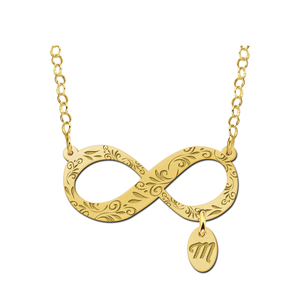 Gold infinity necklace with elegant engraving and initial charm