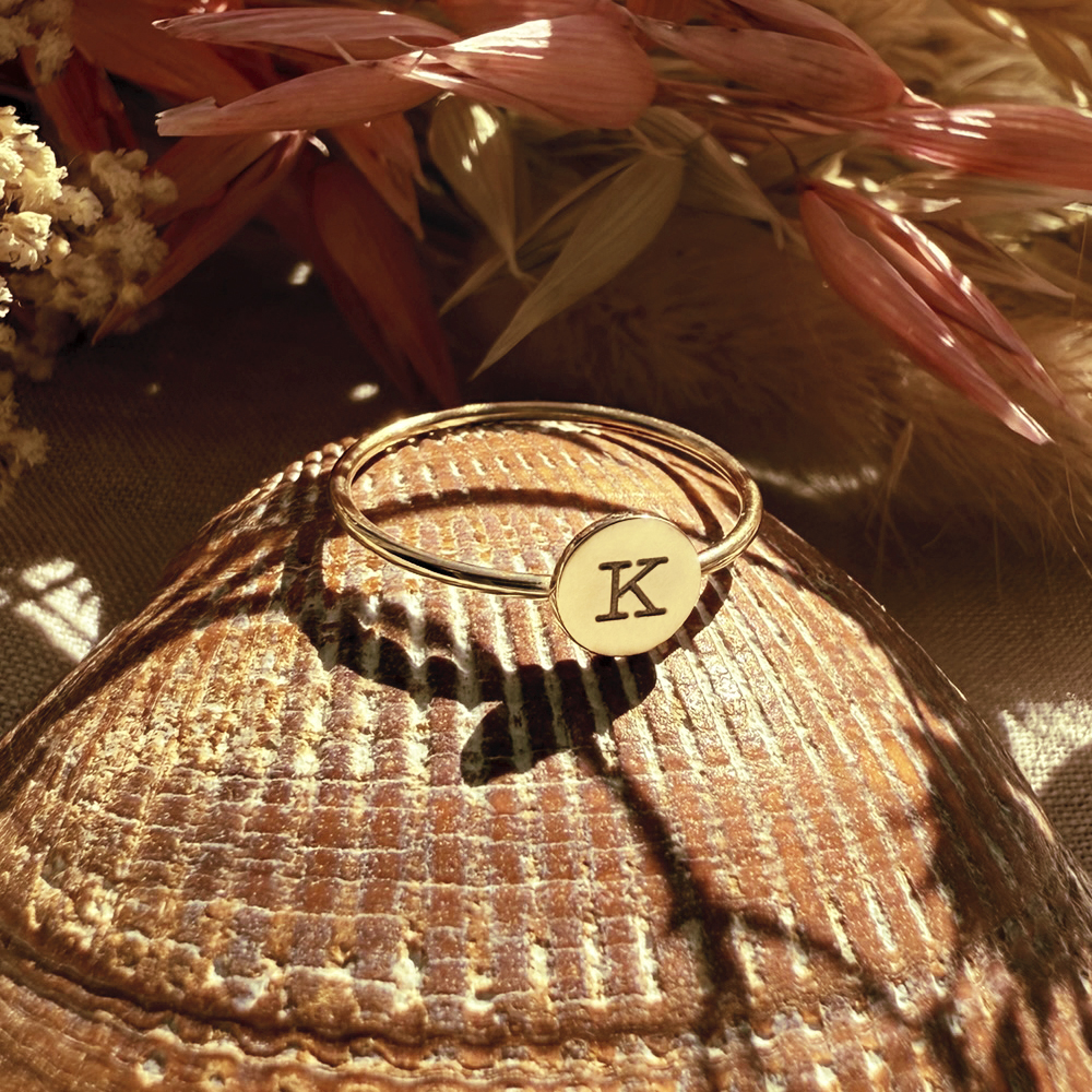Gold ring with initial  round