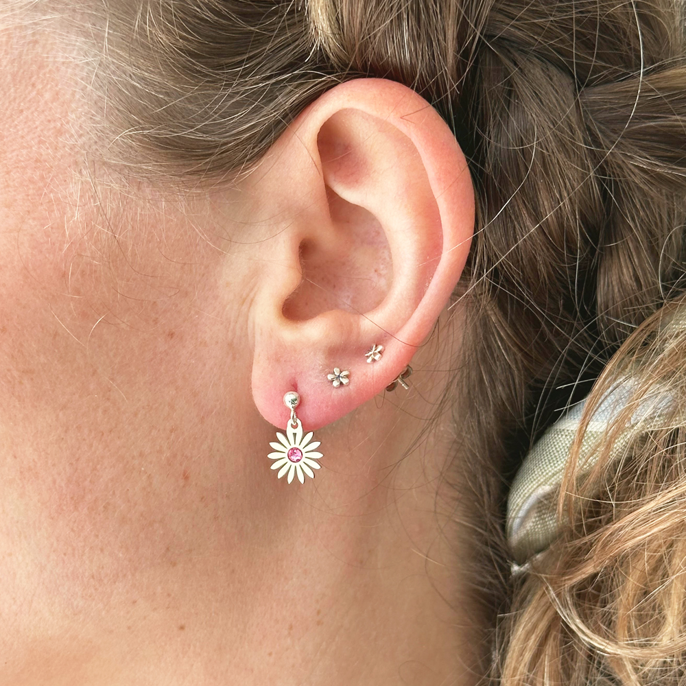 Silver earrings with daisy birthstone