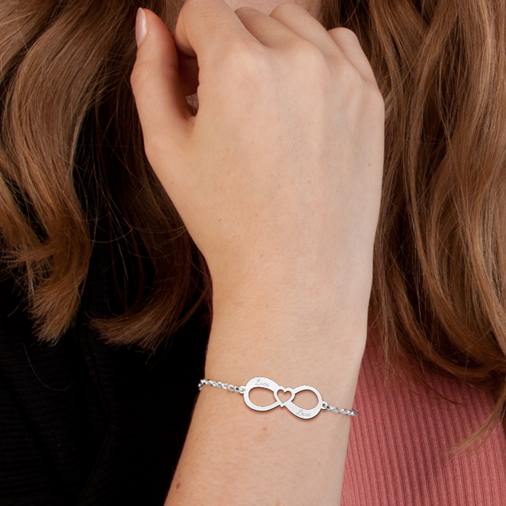 Silver infinity bracelet with two names with heart