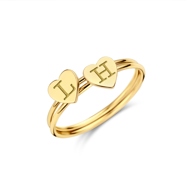 Gold ring with heart and initial
