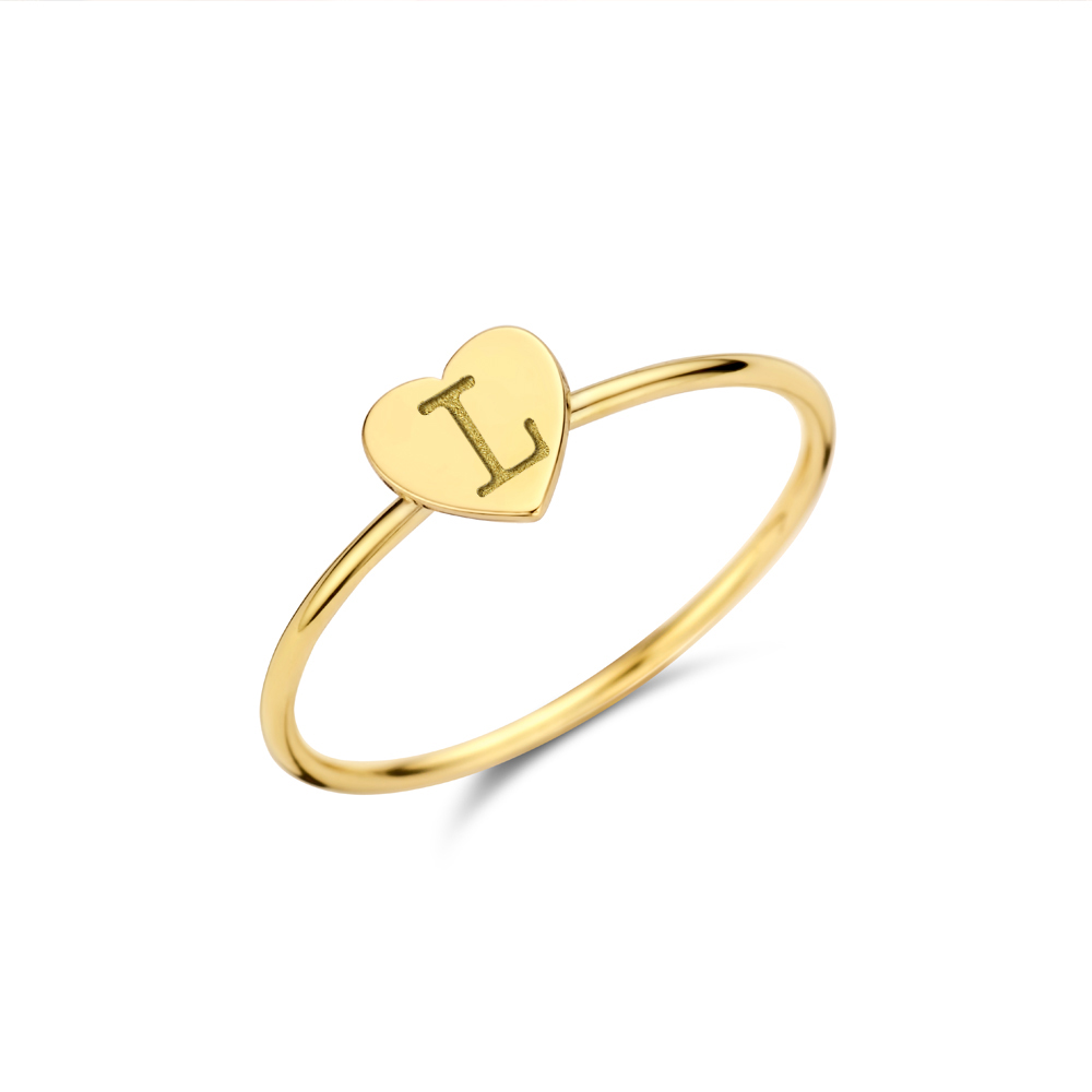Gold ring with heart and initial