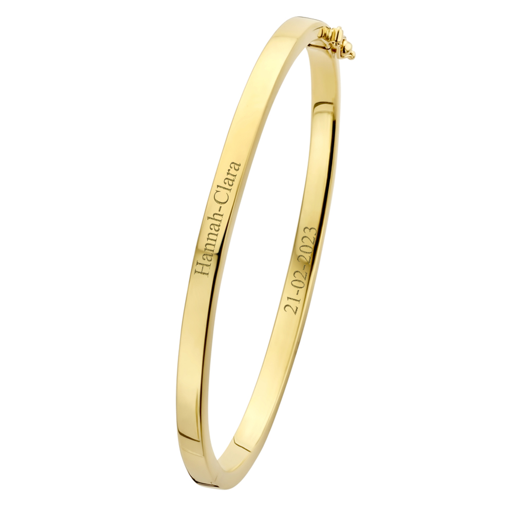 Gold bangle bracelet flat with a engraving