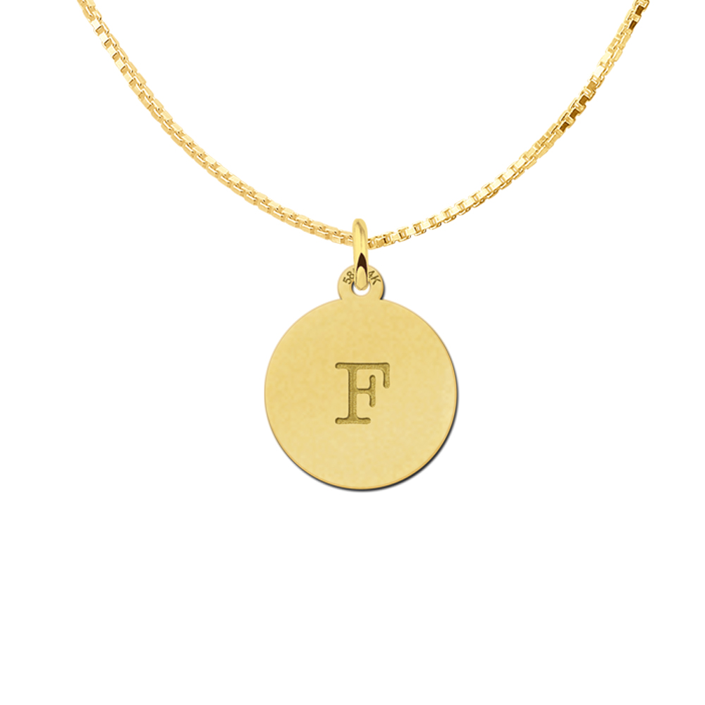 Gold necklace with letter