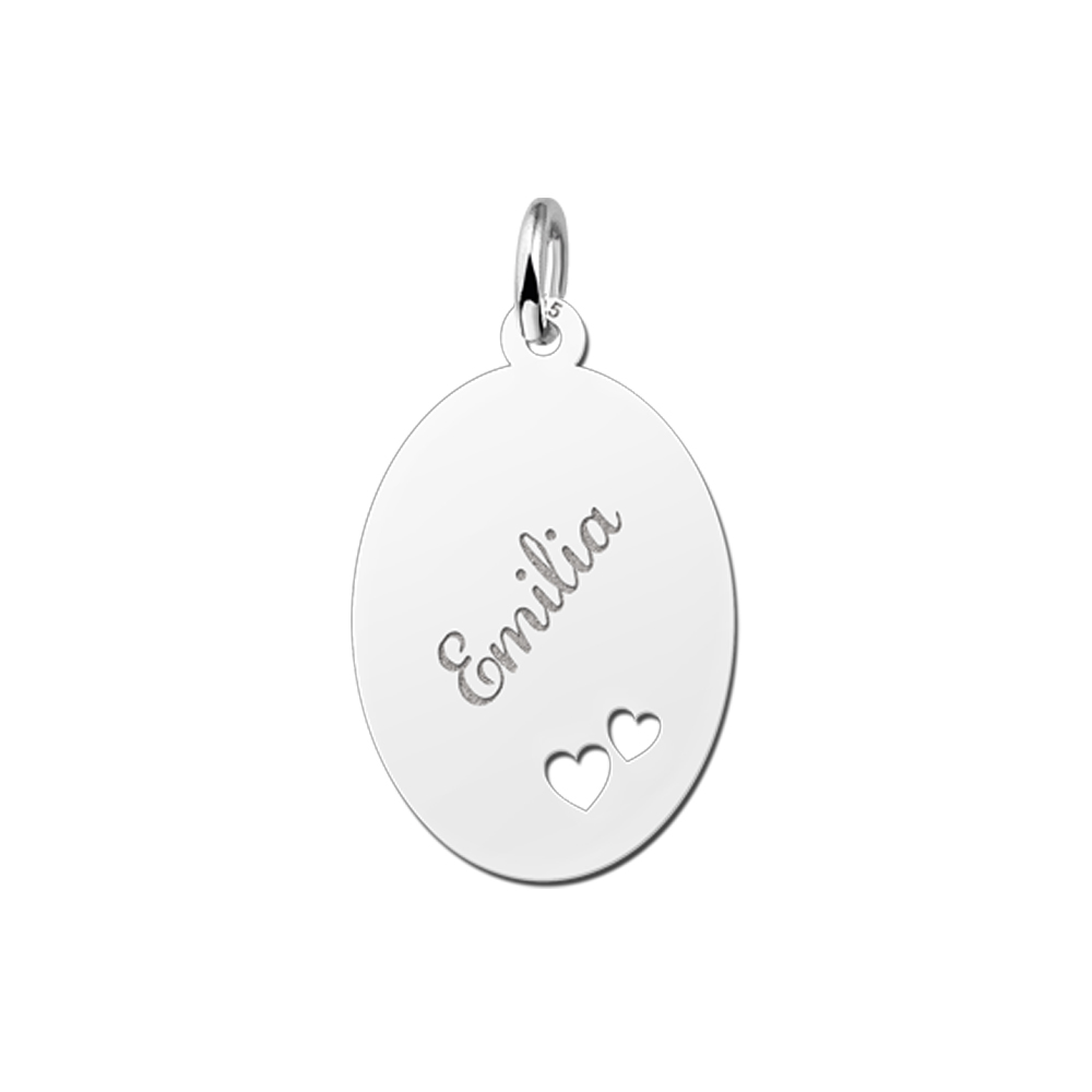 Silver oval pendant with two hearts