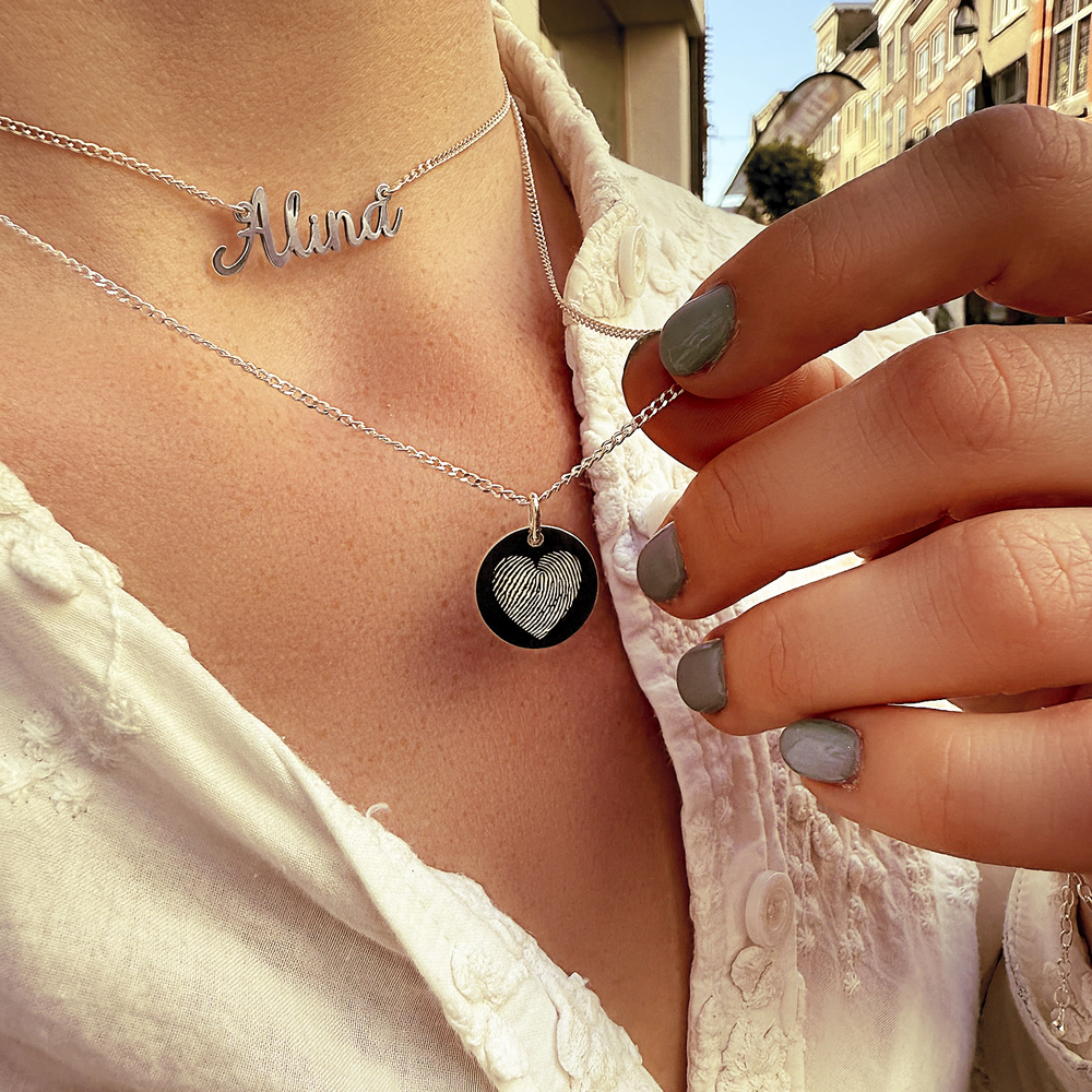 Sterling silver round pendant with heart-shaped fingerprint