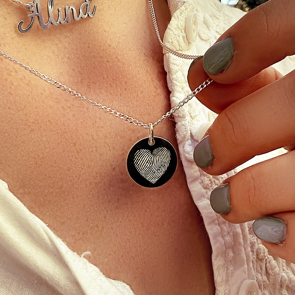 Sterling silver round pendant with heart-shaped fingerprint