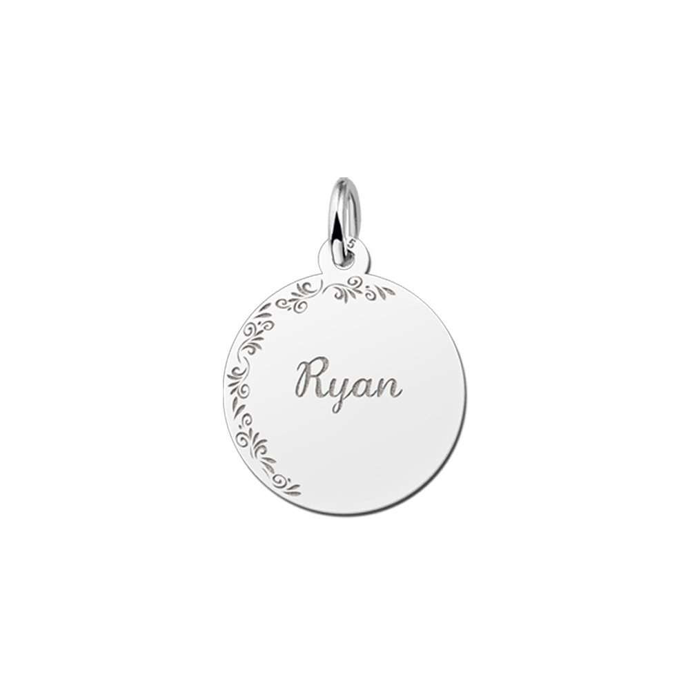 Silver round pendant with floral edge and name