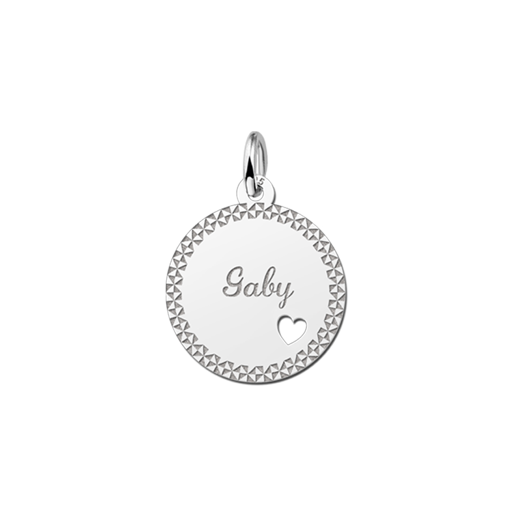 Silver pendant with decorative edge and heart