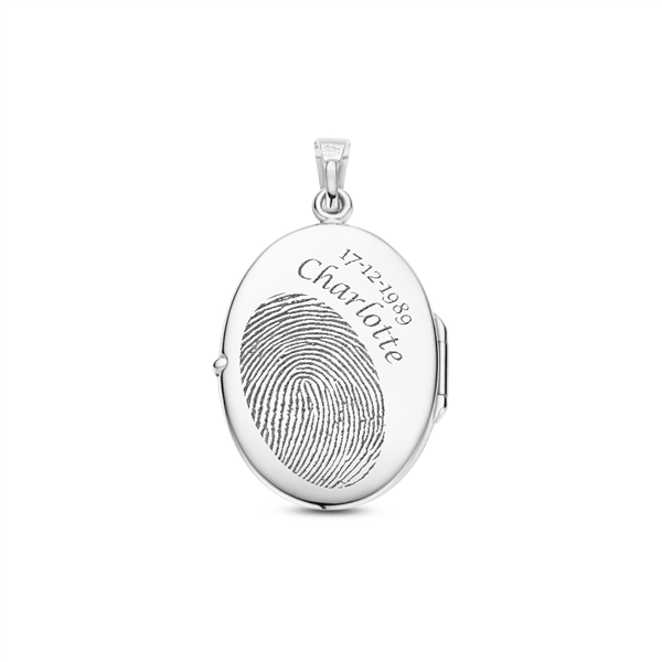 Silver medallion oval with engraving