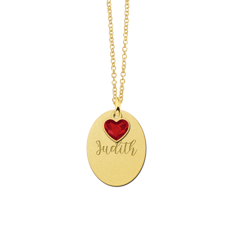 Golden oval pendant with hanging swarovski stone