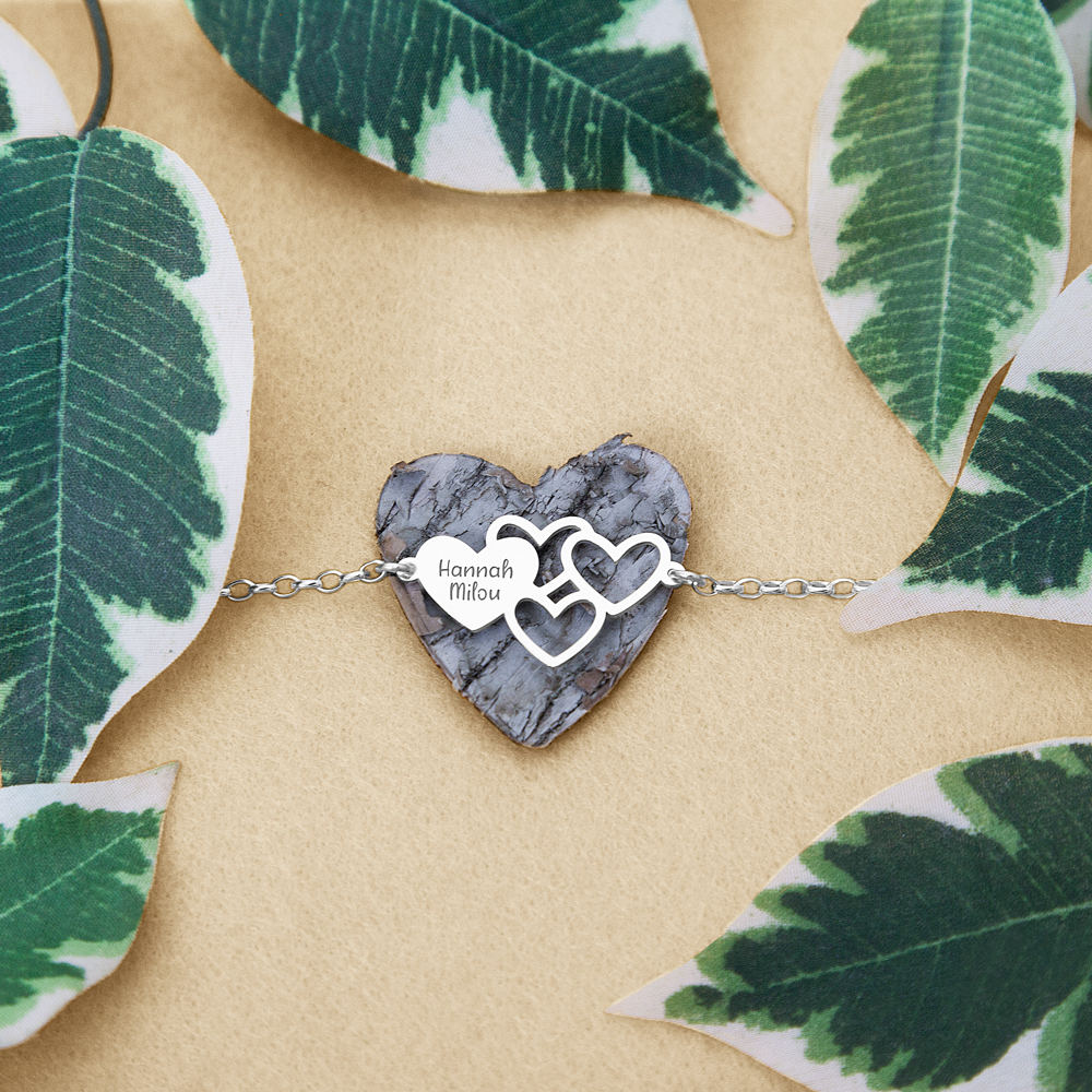 Silver bracelet with names and hearts